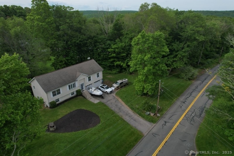 31 Town Farm Rd, Ledyard, CT 06339 - aerial view of a heavily wooded area