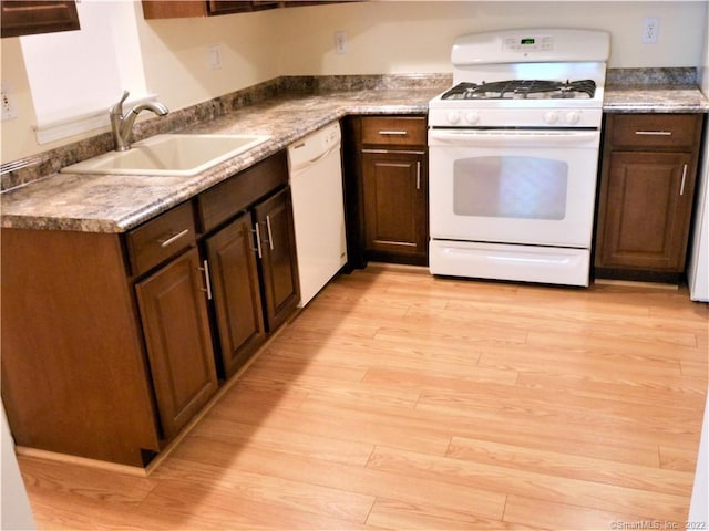 18 Greenview Ln Unit 18, Milford, CT 06461 - kitchen with white appliances and light wood finished floors