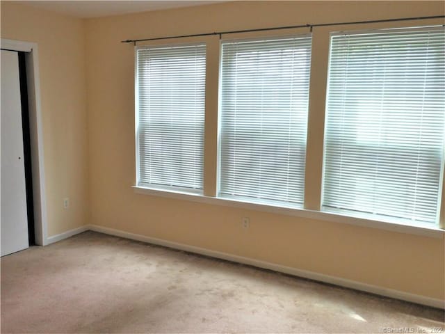 18 Greenview Ln Unit 18, Milford, CT 06461 - empty room featuring carpet floors and baseboards