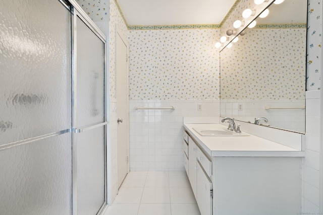 345 Hollow Tree Ridge Rd, Darien, CT 06820 - bathroom with a stall shower, vanity, tile walls, a wainscoted wall, and tile patterned floors