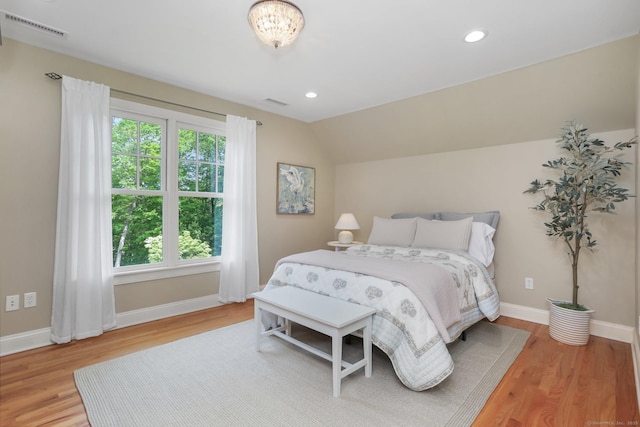 110 Florence Ln, Fairfield, CT 06824 - bedroom with wood finished floors, baseboards, vaulted ceiling, and recessed lighting