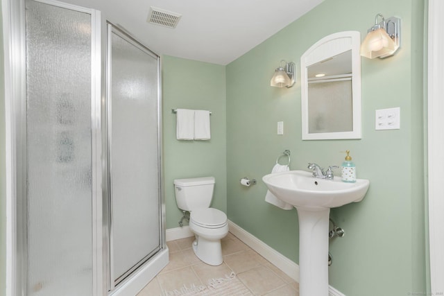 110 Florence Ln, Fairfield, CT 06824 - full bathroom with a stall shower, toilet, tile patterned floors, baseboards, and a sink