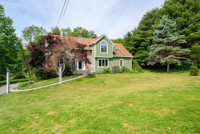 101 Railtree Hill Rd, Woodbury, CT 06798 - view of front of home with a chimney and a front yard