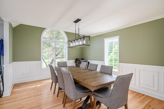 101 Railtree Hill Rd, Woodbury, CT 06798 - dining area featuring light wood finished floors, a wainscoted wall, a decorative wall, and crown molding