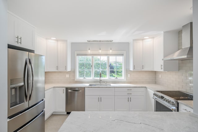 101 Railtree Hill Rd, Woodbury, CT 06798 - kitchen with appliances with stainless steel finishes, a sink, wall chimney exhaust hood, light stone countertops, and tasteful backsplash