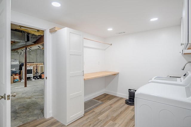 101 Railtree Hill Rd, Woodbury, CT 06798 - washroom featuring cabinet space, washer and clothes dryer, an office area, light wood-style flooring, and recessed lighting