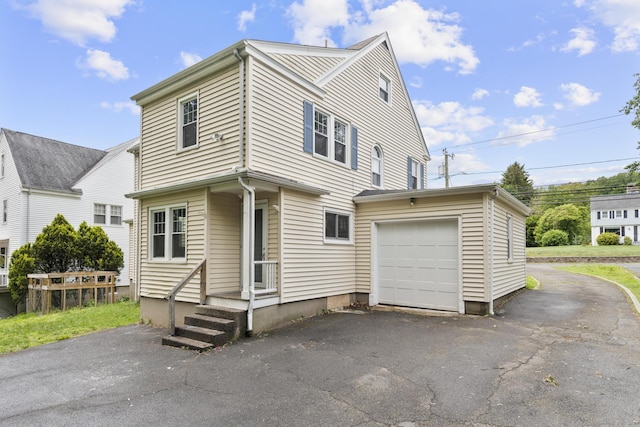 1897 Stanley St, New Britain, CT 06053 - view of front of property featuring asphalt driveway