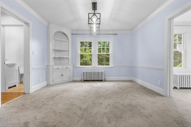 1897 Stanley St, New Britain, CT 06053 - unfurnished dining area with radiator heating unit, carpet floors, ornamental molding, and baseboards