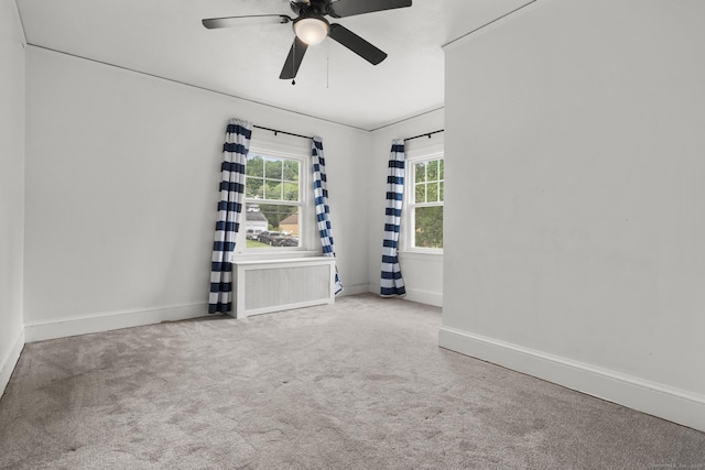 1897 Stanley St, New Britain, CT 06053 - unfurnished room with ceiling fan, radiator, baseboards, and carpet floors