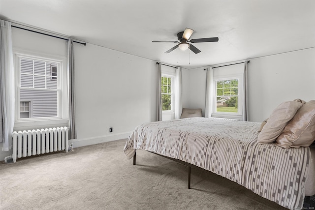 1897 Stanley St, New Britain, CT 06053 - carpeted bedroom with radiator heating unit, baseboards, and a ceiling fan