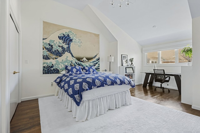123 Harbor Dr Apt 403, Stamford, CT 06902 - bedroom with wood finished floors, vaulted ceiling, baseboards, and a chandelier