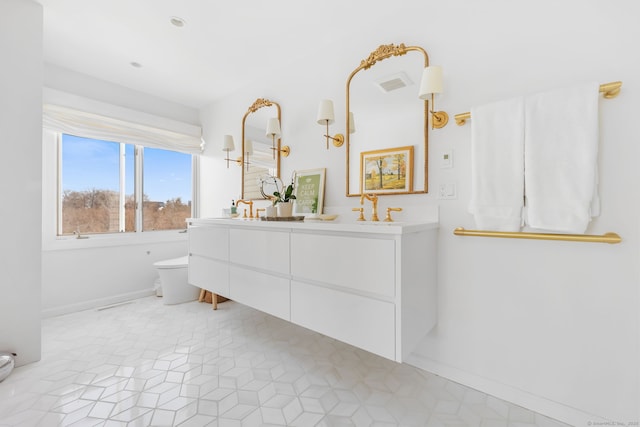 123 Harbor Dr Apt 403, Stamford, CT 06902 - full bath with double vanity, toilet, and baseboards