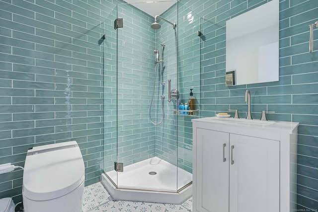123 Harbor Dr Apt 403, Stamford, CT 06902 - bathroom with tile walls, toilet, a shower stall, and vanity