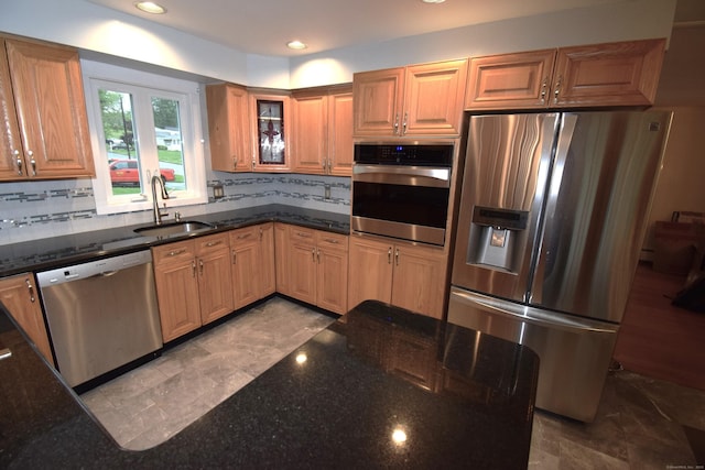 15 Valley Brook Rd, Branford, CT 06405 - kitchen with appliances with stainless steel finishes, a sink, dark stone counters, backsplash, and recessed lighting
