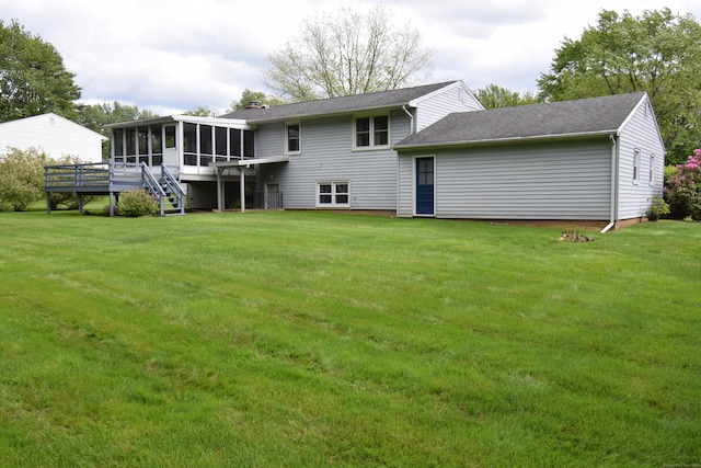 15 Valley Brook Rd, Branford, CT 06405 - back of house with a sunroom, a lawn, a shingled roof, and stairway