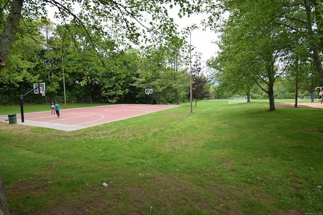 15 Valley Brook Rd, Branford, CT 06405 - view of basketball court featuring community basketball court, a lawn, and view of wooded area