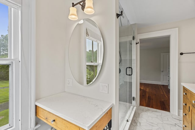 131 Elm St, Guilford, CT 06437 - full bath featuring vanity, a shower stall, and tile patterned flooring