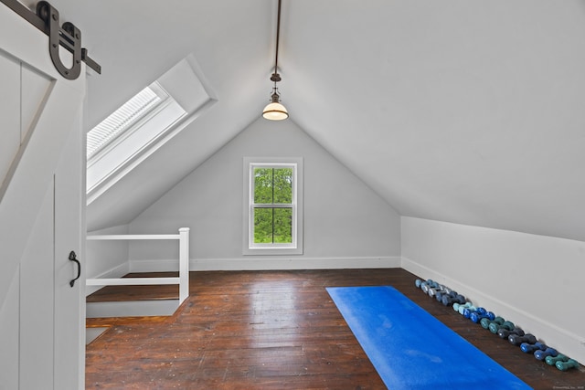 131 Elm St, Guilford, CT 06437 - bonus room featuring lofted ceiling, wood-type flooring, and baseboards