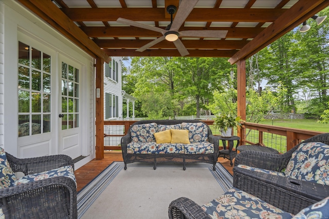 131 Elm St, Guilford, CT 06437 - wooden deck featuring an outdoor hangout area, ceiling fan, and view of wooded area