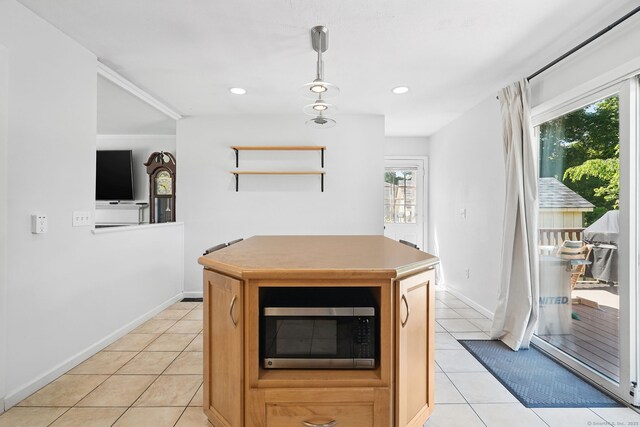 9 Waterhorse Brook Dr, Bethel, CT 06801 - kitchen featuring stainless steel microwave, light tile patterned floors, plenty of natural light, and recessed lighting