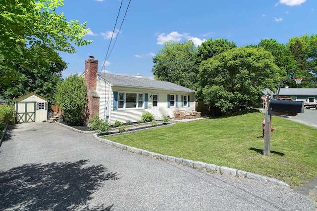 9 Waterhorse Brook Dr, Bethel, CT 06801 - ranch-style home with a chimney, a front yard, and a shingled roof