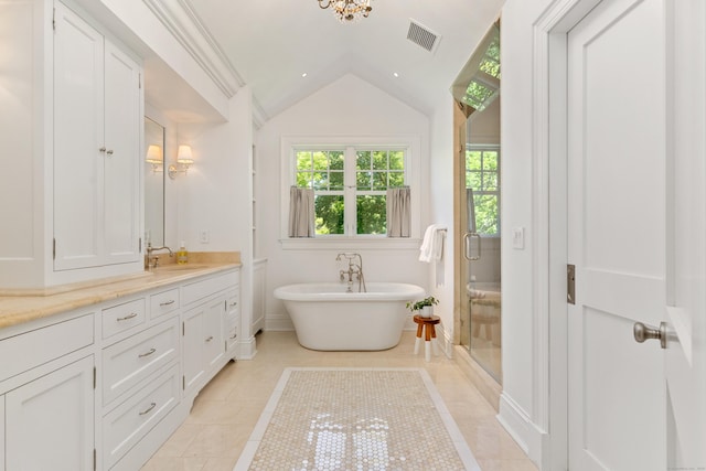 80 Compo Rd N, Westport, CT 06880 - full bathroom featuring vanity, a freestanding tub, vaulted ceiling, tile patterned flooring, and a shower stall