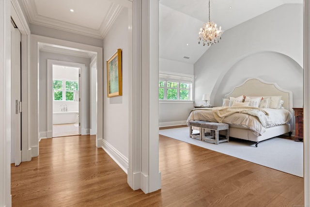 80 Compo Rd N, Westport, CT 06880 - bedroom with light wood finished floors, a chandelier, baseboards, crown molding, and lofted ceiling
