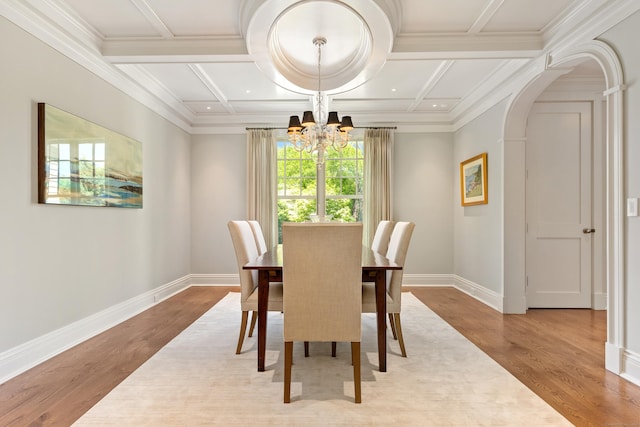 80 Compo Rd N, Westport, CT 06880 - dining space with a chandelier, wood finished floors, baseboards, arched walkways, and coffered ceiling