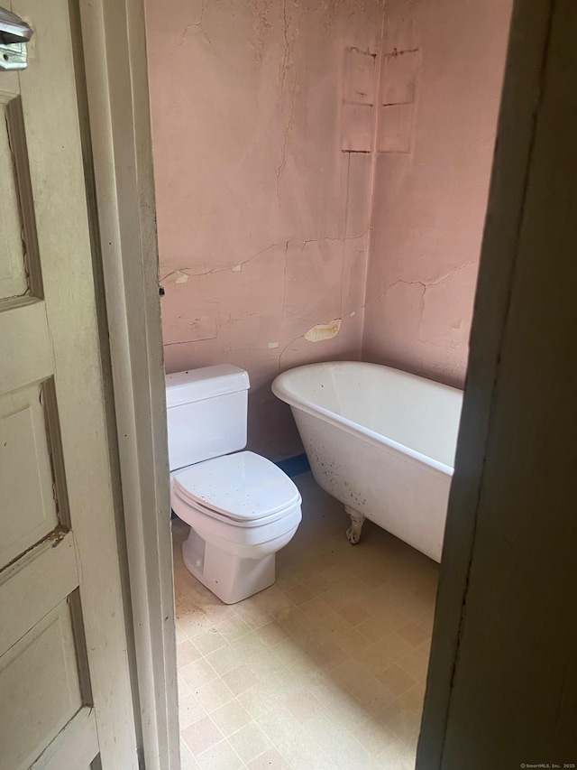 235 Long Hill Ave, Shelton, CT 06484 - bathroom featuring a freestanding tub and toilet