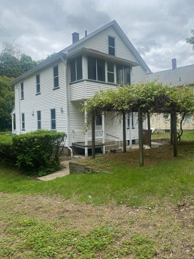 235 Long Hill Ave, Shelton, CT 06484 - back of property featuring a chimney