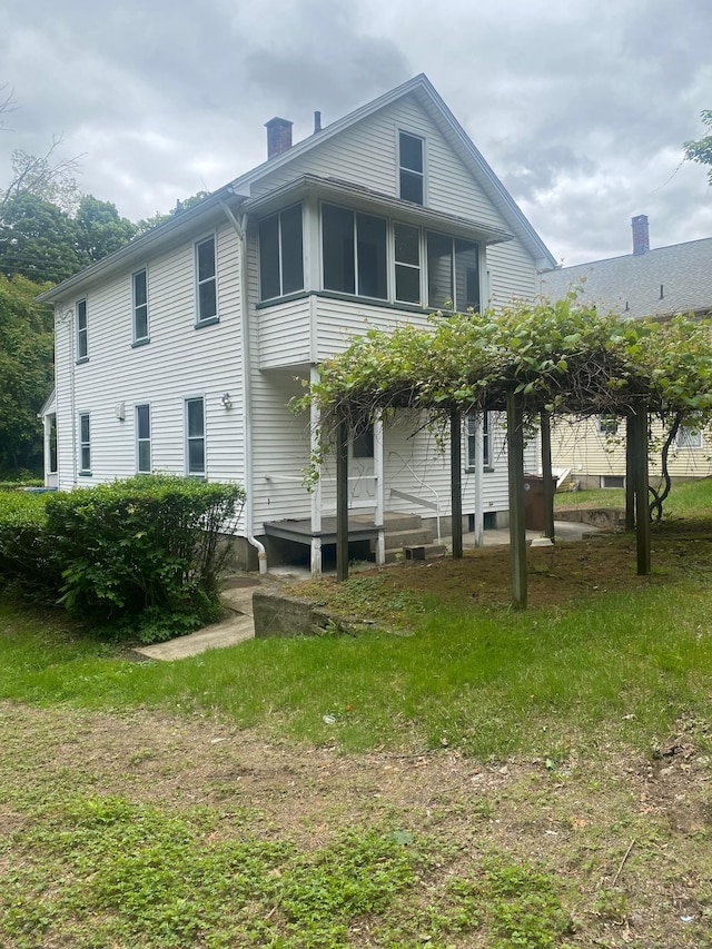 235 Long Hill Ave, Shelton, CT 06484 - back of house featuring a chimney