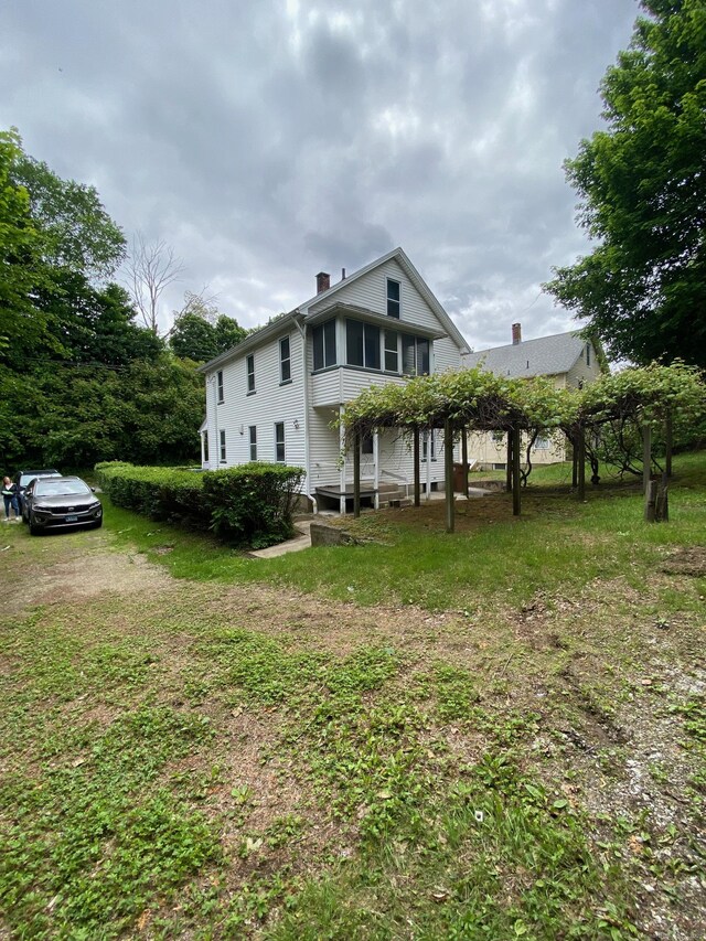 235 Long Hill Ave, Shelton, CT 06484 - view of front of home featuring a chimney