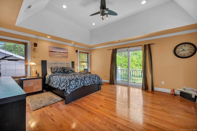 70 Birchwood Dr, Middletown, CT 06457 - bedroom with access to outside, multiple windows, light wood finished floors, recessed lighting, and lofted ceiling