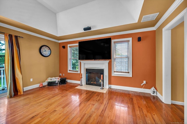 70 Birchwood Dr, Middletown, CT 06457 - unfurnished living room with wood finished floors, a fireplace with flush hearth, baseboards, and crown molding