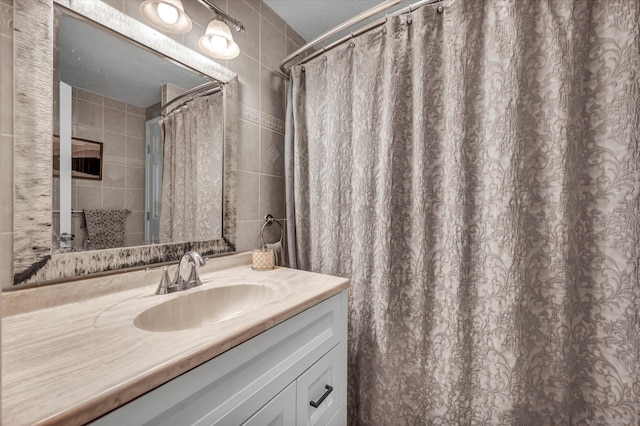 70 Birchwood Dr, Middletown, CT 06457 - bathroom with vanity, tile walls, and curtained shower