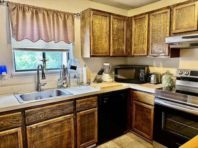 309 High Path Rd Unit 309, Windsor, CT 06095 - kitchen featuring black appliances, a sink, under cabinet range hood, and light countertops