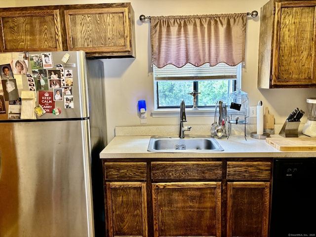 309 High Path Rd Unit 309, Windsor, CT 06095 - kitchen with freestanding refrigerator, black dishwasher, a sink, and light countertops