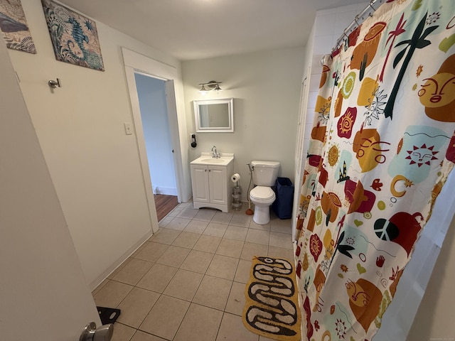 124 Richards St, West Haven, CT 06516 - full bathroom featuring vanity, tile patterned floors, toilet, a shower with curtain, and baseboards