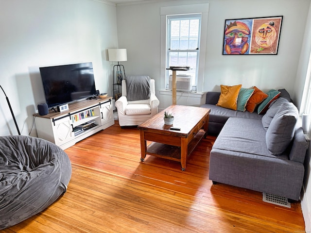 124 Richards St, West Haven, CT 06516 - living room featuring light wood-style floors, ornamental molding, and cooling unit