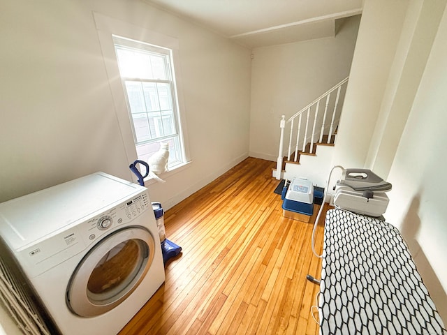124 Richards St, West Haven, CT 06516 - washroom featuring washer / dryer, light wood-style flooring, and baseboards