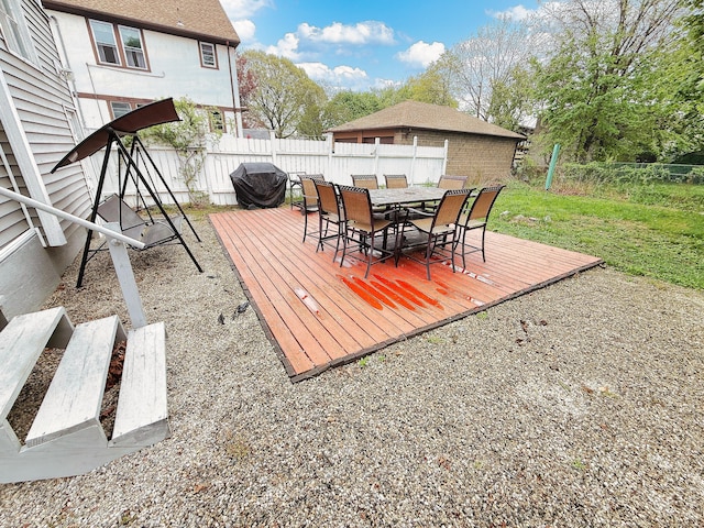 124 Richards St, West Haven, CT 06516 - wooden deck with a fenced backyard and outdoor dining area
