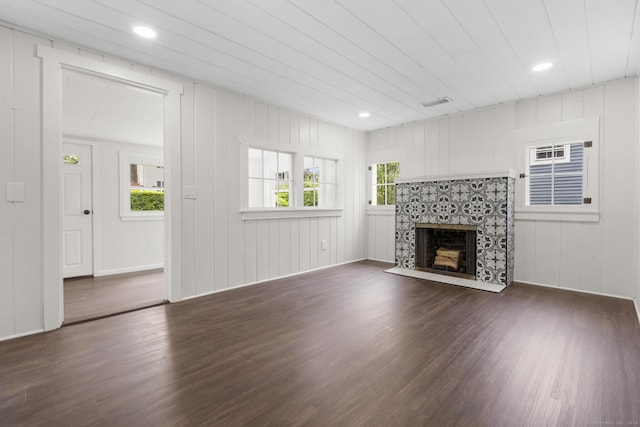 30 Buena Vista St, Farmington, CT 06085 - unfurnished living room with plenty of natural light, dark wood-style flooring, a tile fireplace, and recessed lighting
