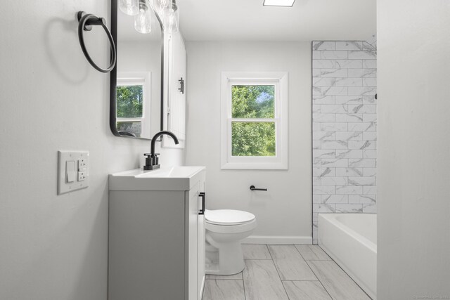 30 Buena Vista St, Farmington, CT 06085 - bathroom with marble finish floors, vanity, toilet, baseboards, and bathtub / shower combination