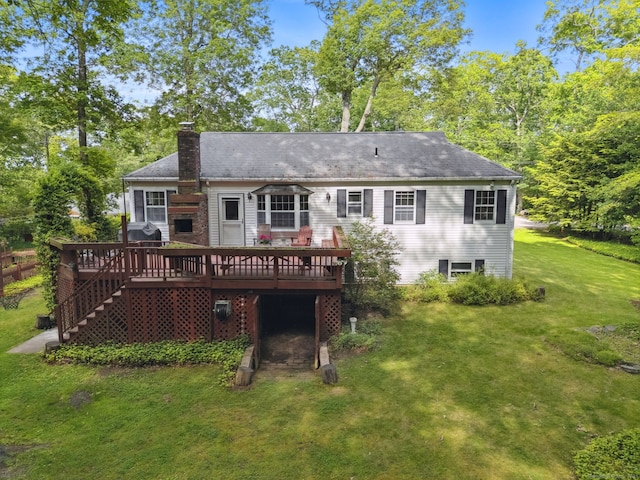 49 Longwood Dr, East Haddam, CT 06415 - rear view of property featuring a chimney, a deck, a yard, and stairway