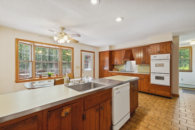 49 Longwood Dr, East Haddam, CT 06415 - kitchen featuring white appliances, a sink, light countertops, and brown cabinetry
