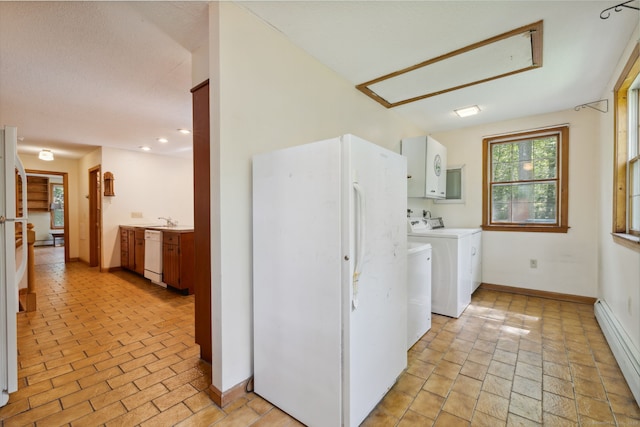 49 Longwood Dr, East Haddam, CT 06415 - washroom featuring cabinet space, washing machine and clothes dryer, a baseboard heating unit, and baseboards
