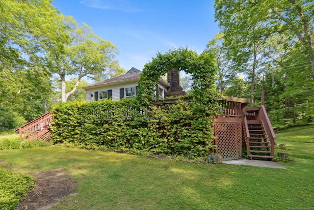 49 Longwood Dr, East Haddam, CT 06415 - view of grassy yard with stairway and a wooden deck
