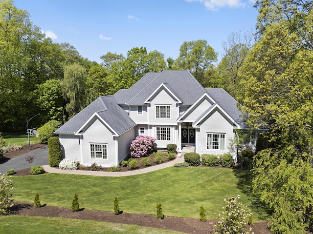 35 Bart Dr, Canton, CT 06019 - traditional-style house featuring a front yard and roof with shingles