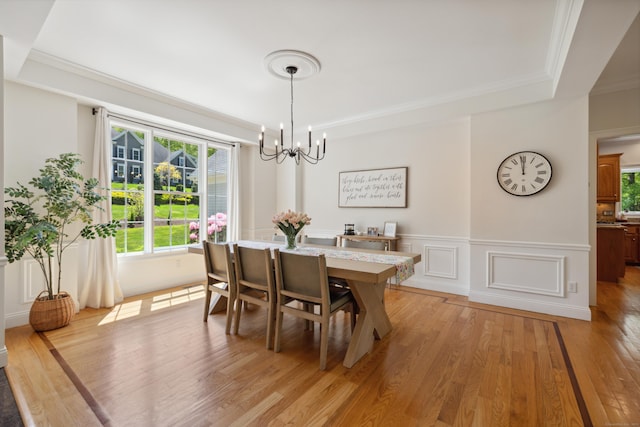 35 Bart Dr, Canton, CT 06019 - dining room with a tray ceiling, a chandelier, light wood-style flooring, healthy amount of natural light, and crown molding
