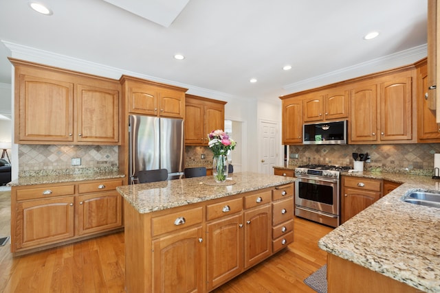 35 Bart Dr, Canton, CT 06019 - kitchen featuring stainless steel appliances, a kitchen island, backsplash, ornamental molding, and recessed lighting